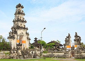 A paduraksa (left) marks the entrance into the main sanctum of the temple, while the candi bentar (right) marks the entrance into the outer sanctum of the temple. Kuta Bali Indonesia Pura-Gunung-Payung-01.jpg