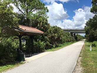 Legacy Trail on the former Venice extension right of way at mile marker 898. The trail's mile markers use the same numbers as the railroad. Legacy Trail @ 681.jpg