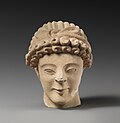 Thumbnail for File:Limestone head of male votary with fillet MET DP263918.jpg