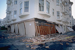 Partial failure due to inadequate shear structure at garage level. Damage in San Francisco due to the Loma Prieta event. LomaPrieta-Marina.jpeg