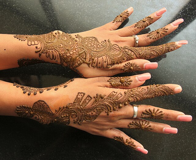 Mehndi applied on the backs of the hand