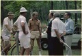 Menahem Begin meets with Jimmy Carter, Zbigniew Brzezinski and Cyrus Vance after a tennis match at Camp David. - NARA - 181223.tif