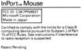 마이크로소프트 인포트(InPort™) 버스 마우스의 하단. FCC ID "C3K7PN9937"를 보여주고 있다.