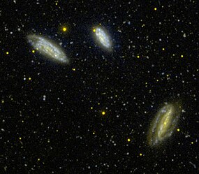 NGC 7582 7590 7599 GALEX WikiSky.jpg