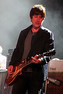Smith with Noel Gallagher's High Flying Birds in 2012.