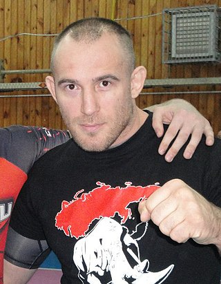 <span class="mw-page-title-main">Aleksei Oleinik</span> Russian sambo wrestler and mixed martial arts fighter