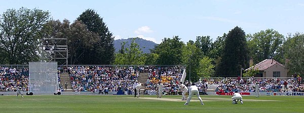 The PM's XI is an annual cricket match at Manuka Oval. The curator's residence is on the right in the background