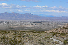 The overview of Pahrump, Nevada, from Pahrump Valley was the starting line of The Amazing Race 2. Pahrump from Carpenter Canyon Road 2.jpg