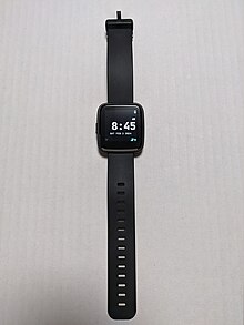 PineTime smartwatch showing the default watch face