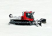 Kässbohrer PistenBully 300 Polar snowcat moving snow