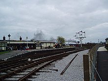 The Brill platform of the second Quainton Road station, sited on the curve between the O&AT and MR lines. The short stretch of rail at the platform is the only surviving part of the route. Quainton Road Station - geograph.org.uk - 18240.jpg