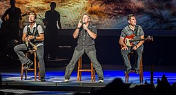 Rascal Flatts spent four weeks at number one with their cover of "What Hurts The Most". Rascal Flatts 2013.jpg