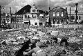 Korean women and children search the rubble of Seoul for anything that can be used or burned as fuel. November 1, 1950. Capt. F. L. Scheiber. (U.S. Army)