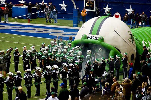 The football team enters the field at Texas Stadium for the 2005 Texas 5A Division II State Championship game, which it won 34–20 against the Katy Tig