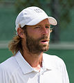 Stéphane Robert competing in the third round of the 2015 Wimbledon Qualifying Tournament at the Bank of England Sports Grounds in Roehampton, England. The winners of three rounds of competition qualify for the main draw of Wimbledon the following week.