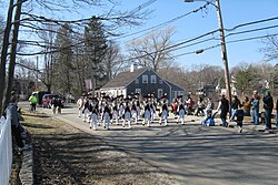 Saint Patrick's Day parade in Scituate, the municipality with the highest percentage identifying Irish ancestry in the United States, at 47.5% in 2010. Irish Americans constitute the largest ethnicity in Massachusetts. St. Patrick Day's Parade, Scituate MA.jpg