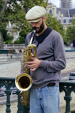 Street musician playing saxophone