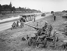 Bofors crew wearing the shoulder patch of 6th Armoured Division during Exercise Bumper, 30 September 1941. The British Army in the United Kingdom 1939-45 H14389.jpg