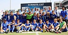 Dynamo Kiev U-17 players celebrating with Subroto Cup trophy at the Ambedkar Stadium in October 2012 The Chief of Air Staff, Air Chief Marshal N.A.K. Browne with the Dynamo Kiev, Ukraine team, winners of the 53rd Edition of Subroto Cup Football Tournament 2012 for Boys (U-17), in New Delhi on October 01, 2012.jpg