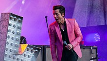 Flowers onstage at BST Hyde Park in 2017 The Killers - BST Hyde Park - Saturday 8th July 2017 KillersBST080717-33 (35034823704).jpg