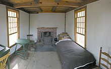 Reconstruction of Henry David Thoreau's cabin on the shores of Walden Pond Thoreau's cabin inside.jpg