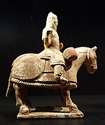 Tomb figurine of a horse with rider, China, Tang dynasty, 618-906 AD, earthenware with traces of red and yellow glaze - Ostasiatiska museet, Stockholm - DSC09585.JPG