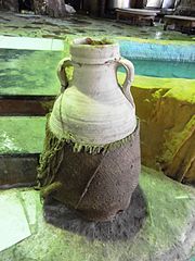 A water jar or qullah might be placed in a mashrabiya for passive cooling