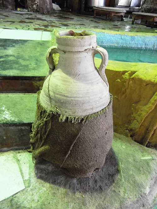 An Egyptian qullah, set in drafts to cool interiors. Porous pottery and coarse cloth maximize the area for evaporation.