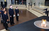 United States Holocaust Memorial Museum. Taking a moment to reflect at the eternal flame in the Hall of Remembrance after a self-guided tour of the museum's exhibits. US Navy 040407-N-2959L-044 After a self-guided tour of the museum's exhibits sailors take a moment to reflect at the eternal flame in the Hall of Remembrance.jpg