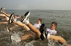 US Navy 040722-N-5526M-005 Naval Sea Cadets take part in a rigorous exercise routine while participating in Diver-Explosive Ordnance Disposal (EOD) Special Operations Program training at the Naval Amphibious Base Little Creek N.jpg