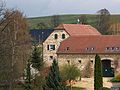 Residential stable house, barn and side building of a three-sided courtyard