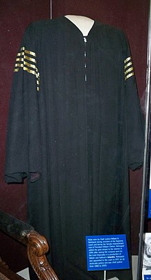 Robes worn by Rehnquist while he presided over the impeachment trial of President Clinton, showing the four yellow stripes he added.