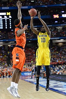 Fair defending against Tim Hardaway Jr. in the 2013 NCAA Men's Division I Basketball Tournament final four. 20130406 Tim Hardaway Jr.jpg