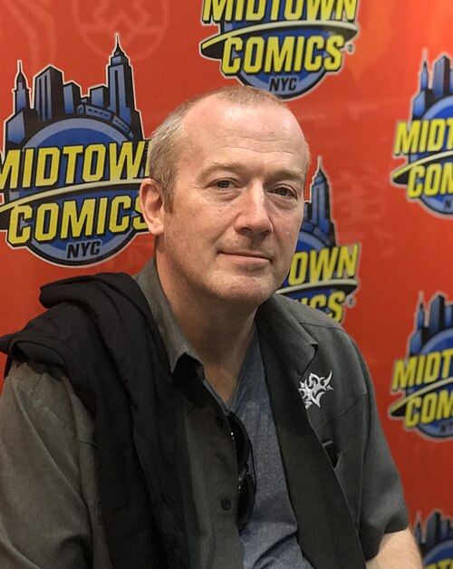 Ennis at a book signing at Midtown Comics in Manhattan in 2019