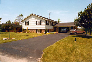 Front yard portion of land between the street and the front of the house