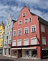 Residential and commercial building in a corner