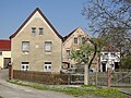 Residential house with extension in open development