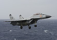 MiG-29K operates from INS Vikramaditya An Indian Navy MIG-29K Fulcrum flies over the aircraft carrier USS Nimitz (CVN 68) during Exercise Malabar 2017.jpg