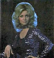 Barbara Mandrell in a sparkling dress.