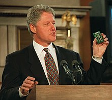The U.S. President Bill Clinton holding a V-chip in 1996 Bill Clinton presenting the V-chip.jpg
