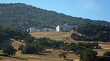 The Buck Institute for Research on Aging is a world leader on aging-associated diseases research. Buck Institute for Research on Aging, Novato, California -- campus, as seen from Hwy 101.jpg