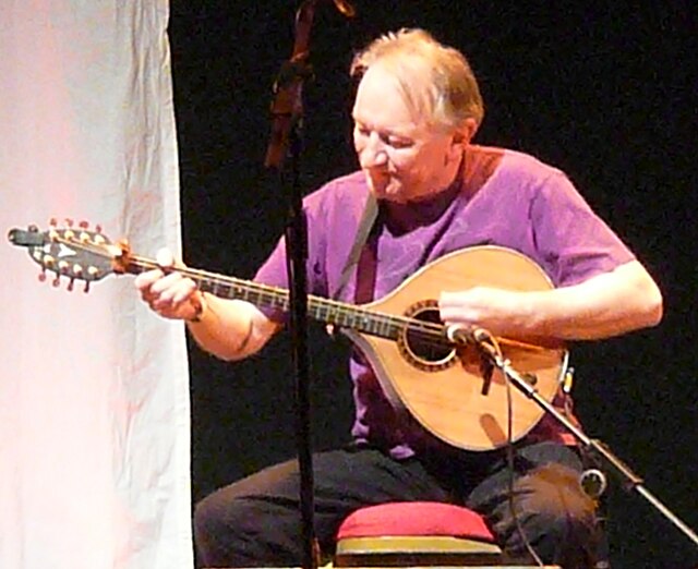 Lunny playing the bouzouki, 2012