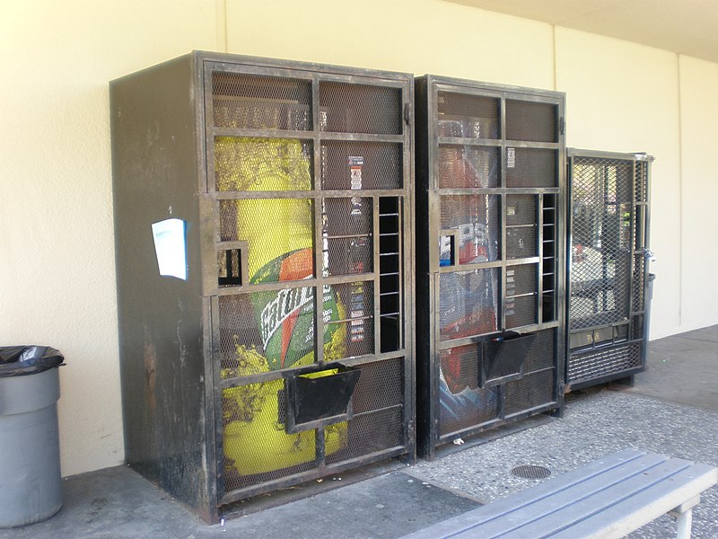 File:ECHS SSF 3 vending machines in cages.JPG