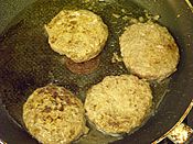 Vegetarian bean burgers cooking