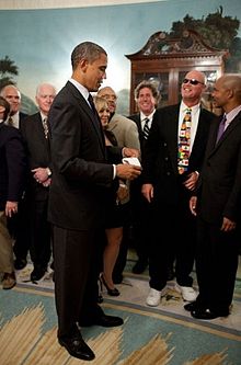 McMahon at the White House with President Obama in 2011 Jim McMahon and Obama.jpg