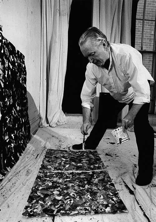 Joseph Glasco painting an abstract painting in his studio in the early 1990s.