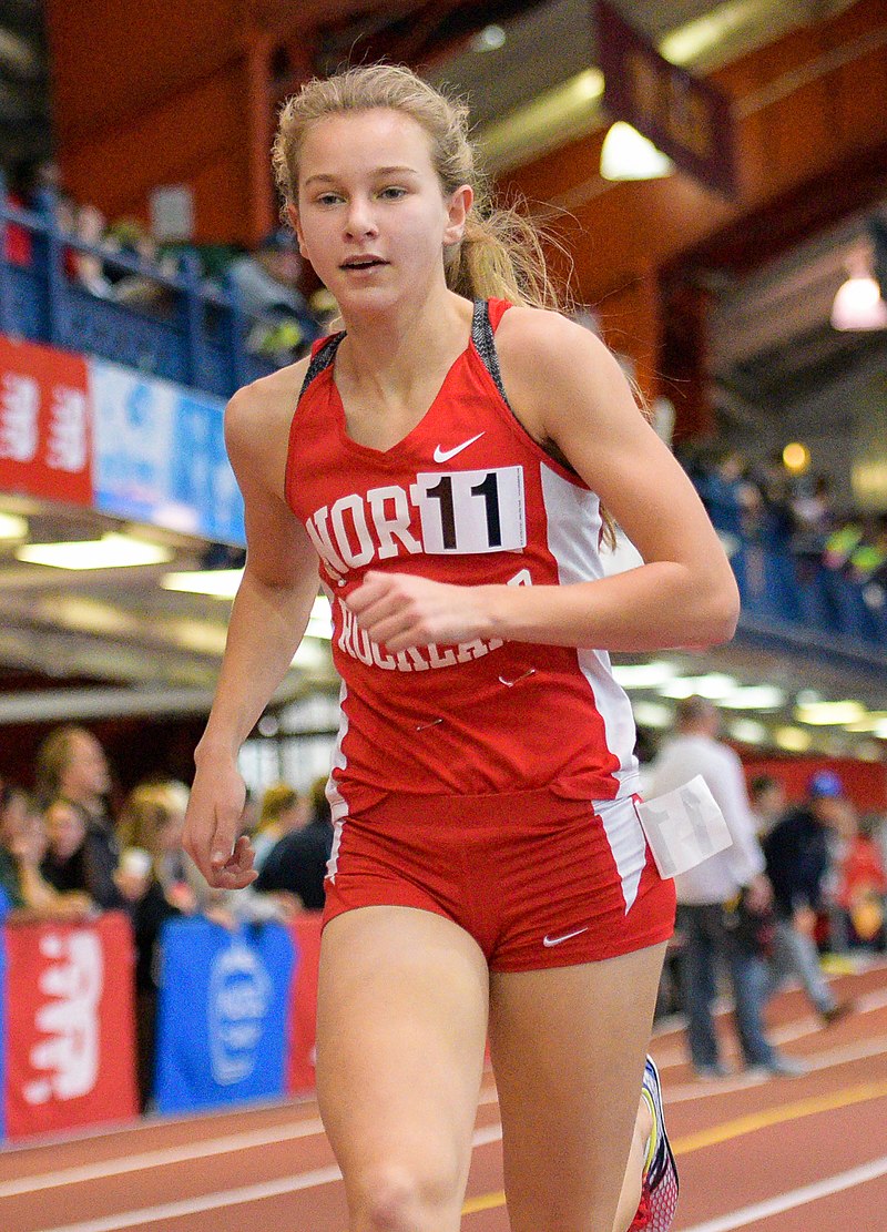 Track-and-field athletics. Young Caucasian woman, professional