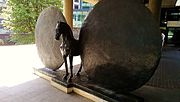 Union (Horse with Two Discs): a public sculpture by Christopher Le Brun outside the Museum