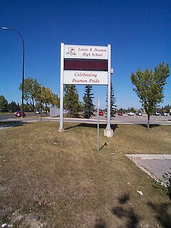The school's sign (since replaced) on the left side of the building with the motto "Celebrating Pearson Pride" Lester B. Pearson High School 9.jpg