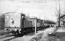 Ancienne carte postale d'un train en gare de l'Abbaye.